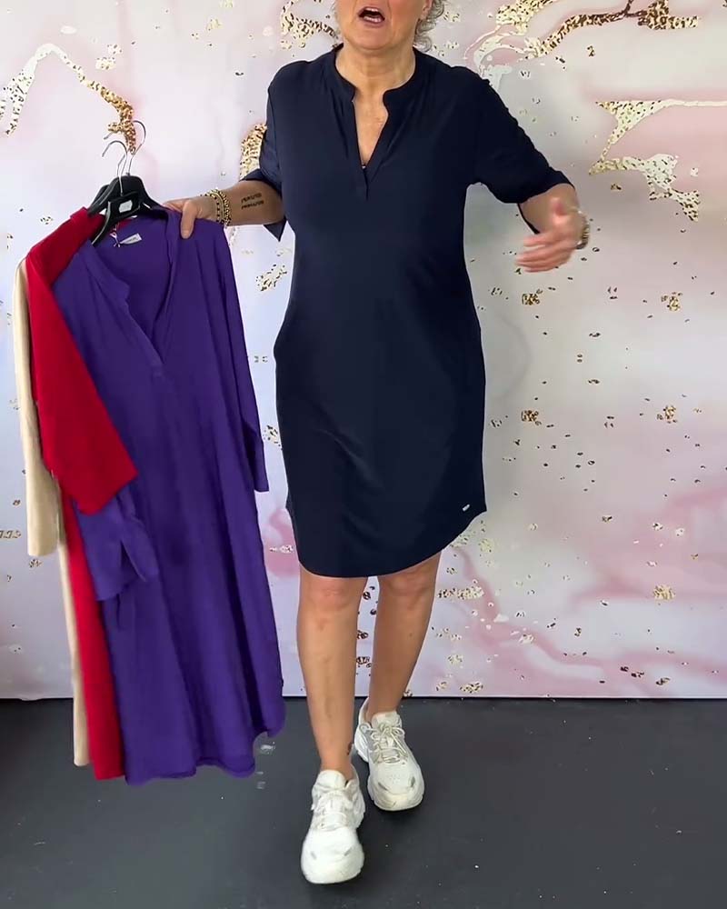 Hanneke -Solid-colored dress with V-neck